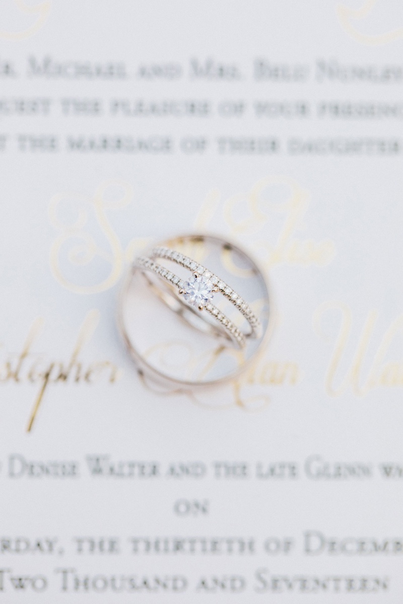 Solitaire Engagement Ring %26 Pavé Band
Photography: Anastasiia Photography
Read More:
http://www.insideweddings.com/weddings/interfaith-wedding-with-purple-emerald-color-palette-in-florida/1300/ wedding rings on invitation by oda creative yellow gold round diamond engagement ring pave band ring