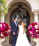 Bride %26 Groom at Bride's Family Home
Photography: Samuel Lippke Studios
Read More:
http://www.insideweddings.com/weddings/pretty-in-pink-wedding-at-the-brides-family-home-in-beverly-hills/1231/ wedding portrait under archway at beverly hills private home urns filled with bright pink flowers