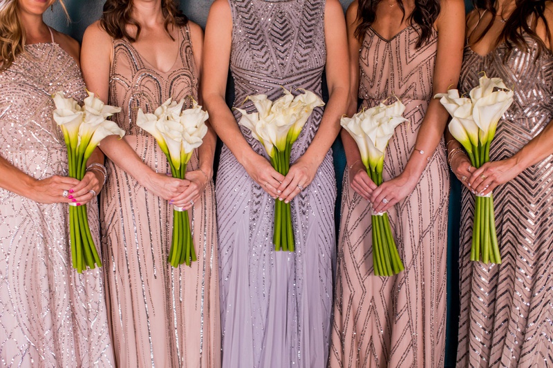 Calla Lily Bridesmaid Bouquets
Photography: Laura Grier of Beautiful Day Photography
Read More:
http://www.insideweddings.com/weddings/glamorous-art-deco-inspired-wedding-in-downtown-los-angeles/1162/ bridesmaid bouquets of calla lilies, adrianna pappell sequin bridesmaid dresses