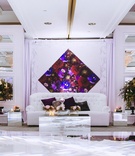 Purple, White %26 Silver After-Party Décor
Photography: Aesthetiica Photography
Read More:
http://www.insideweddings.com/weddings/modern-fall-wedding-with-courtyard-ceremony-rooftop-reception/1069/ White lounge furniture around dance floor flower arrangements diamond purple art and accessories