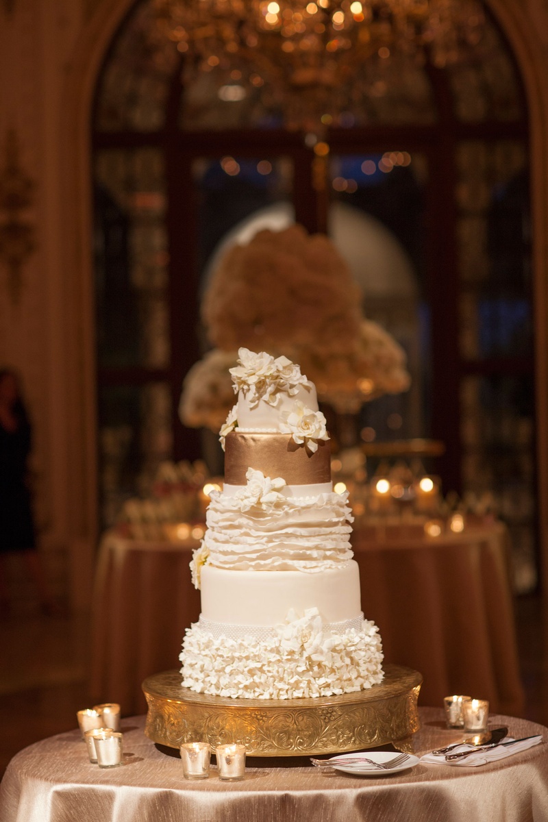 White Ruffle %26 Gold Wedding Cake
Photography: Nancy Cohn Photography
Read More:
http://www.insideweddings.com/weddings/destination-wedding-with-white-gold-color-palette-in-palm-beach/1028/ Wedding reception white ruffle and fondant wedding cake gold top layer and stand