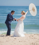 Happy Couple on Montauk Beach
Photography: Kiss Me in Paris
Read More:
http://www.insideweddings.com/weddings/ocean-view-ceremony-romantic-reception-with-chic-coastal-elements/1190/ wedding portrait bride groom reaction first look parasol beach montauk east coast new york
