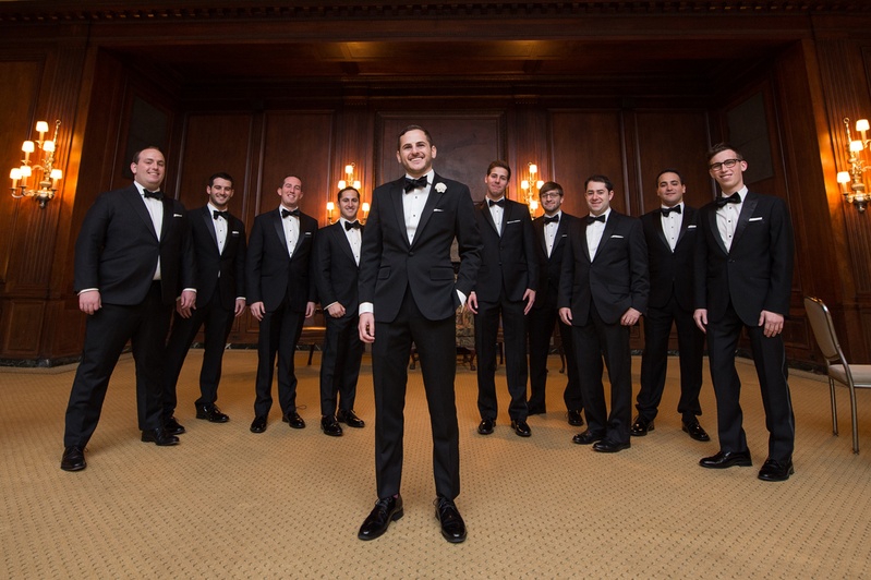 Groom Stands in Front of Groomsmen
Photography: Carasco Photography
Read More:
http://www.insideweddings.com/weddings/jewish-wedding-with-classic-ivory-and-gold-decor-in-chicago/983/ groom in bonobos tuxedo and bow tie, groomsmen