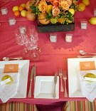 Vibrant Citrus Tablescape
Photography: Paul Barnett Photographer
Read More:
http://www.insideweddings.com/weddings/colorful-celebration-with-sentimental-touches/316/ Hot pink wedding reception table with fruit centerpieces