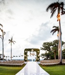 Large Outdoor Ceremony in Palm Beach
Photography: Roey Yohai Studios
Read More:
http://www.insideweddings.com/weddings/luxury-destination-wedding-in-palm-beach-with-almost-700-guests/1249/ wedding ceremony grass lawn palm trees raised aisle seating in the round
