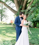 Groom Kissing Bride's Forehead
Photography: Kaylie Plummer Photography
Read More:
http://www.insideweddings.com/weddings/chic-alfresco-hotel-wedding-with-elements-of-modern-greenery/1350/ groom in navy blue tuxedo stands behind bride and kisses her on the forehead