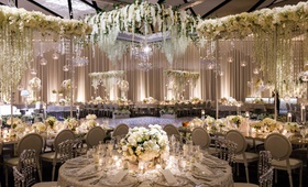 Winter Wonderland Ballroom Reception
Photography: Genevieve Nisly Photography
Read More:
http://www.insideweddings.com/weddings/new-years-eve-wedding-with-a-dreamy-winter-wonderland-theme/1258/ wedding reception ballroom with winter wonderland theme white flowers greenery silver chairs mirror