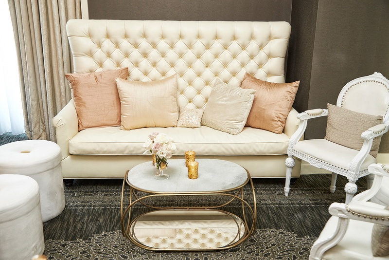 Cream %26 Blush Reception Seating Area
Photography: KingenSmith
Read More:
http://www.insideweddings.com/weddings/catholic-ceremony-soft-romantic-fairy-tale-reception-in-chicago/754/ Reception seating area with a tufted high-backed couch, pink pillows, and white chairs
