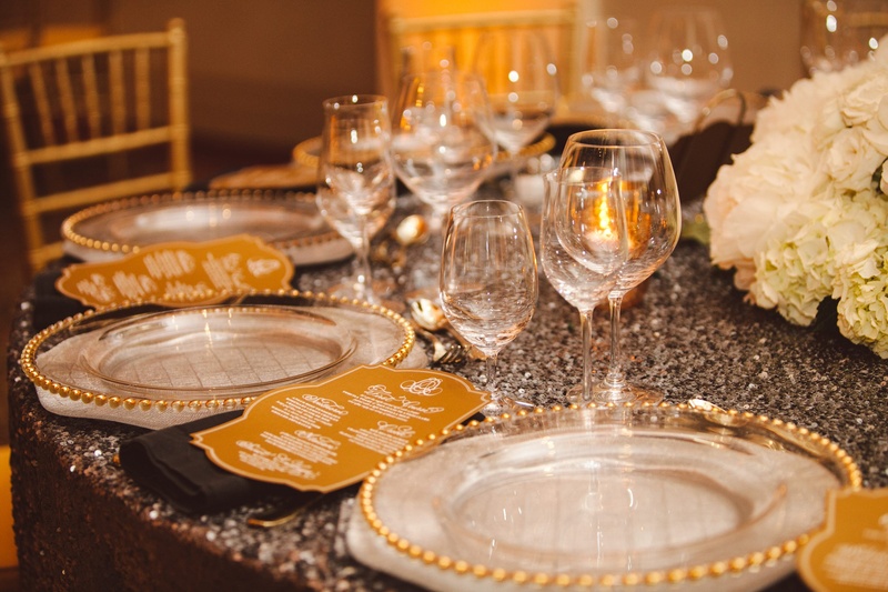 Sparkling Tablescape
Photography: J. Cogliandro Photography
Read More:
http://www.insideweddings.com/weddings/angela-mecca-and-owen-daniels/540/ Black sequin linens and gold-beaded chargers