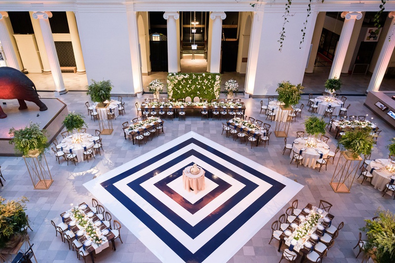 Aerial View of Museum Reception
Photography: Averyhouse
Read More:
http://www.insideweddings.com/weddings/chic-summer-wedding-at-a-natural-history-museum-in-chicago/1361/ wedding reception at the field museum in chicago navy white stripe dance floor cake in center