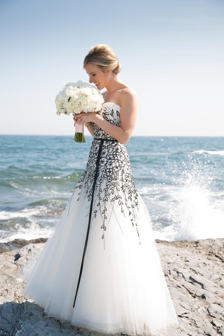 Black %26 White Bridal Gown
Photography: Carrie Rodman Photography
Read More:
http://www.insideweddings.com/weddings/new-england-summer-wedding-by-the-seashore/429/ Bride on coast in Carolina Herrera wedding dress
