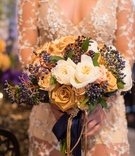 Fall Bouquet with Berries
Photography: Duke Photography
Read More:
http://www.insideweddings.com/weddings/dramatic-tablescape-at-launch-party-for-luxe-linens-newest-line/987/ fall bridal bouquet, amber roses, navy berries