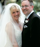 Bride and Groom
Photography: Dalal Photography
Read More:
http://www.insideweddings.com/weddings/garden-themed-spiritual-wedding-on-the-autumnal-equinox/148/ Bride in a veil and groom in a black tuxedo with a striped black-and-silver tie