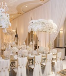 Centerpieces on Tall Gold Stands
Photography: Joe Buissink Photography
Read More:
http://www.insideweddings.com/weddings/a-music-executives-opulent-ivory-gold-wedding-in-beverly-hills/1115/ opulent wedding reception with ivory and gold, floral arrangements on tall gold stands