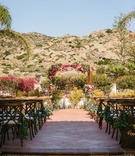 Outdoor Ceremony at Spanish-Style Venue
Photography: Jodee Debes Photography
Read More:
http://www.insideweddings.com/weddings/outdoor-ceremony-reception-with-bright-color-palette-at-la-ranch/1280/ wedding ceremony outside hummingbird nest ranch terracotta tile pink greenery bougainvillea arch