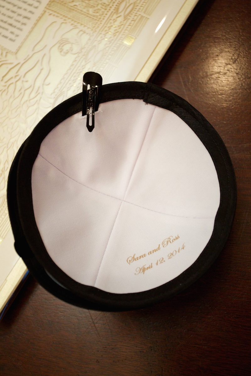 Personalized Black Yarmulke
Photography: Bob %26 Dawn Davis Photography
Read More:
http://www.insideweddings.com/weddings/glamorous-ivory-blush-spring-wedding-at-a-private-club-in-chicago/685/ Black yarmulke with white interior and name of bride and groom, wedding date, for Jewish wedding