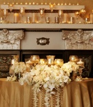 Golden Sweetheart Table
Photography: Tim Otto Photography
Read More:
http://www.insideweddings.com/weddings/new-years-eve-wedding-in-san-diego-california/336/ Fireplace mantle with candles and gold goblets