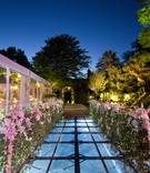 Over-Water Walkway
Photography: Christopher Bobek, Photographer
Read More:
http://www.insideweddings.com/weddings/impressive-colorado-wedding-over-an-olympic-sized-pool/566/ Outdoor reception entrance over Plexiglas pool cover