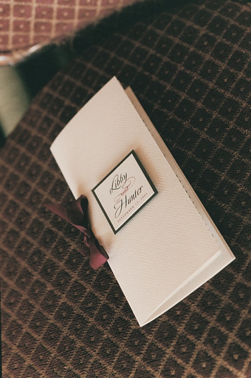 White Program with Red Ribbon
Photography: Max Shaboot Photography
Read More:
http://www.insideweddings.com/weddings/romantic-fall-wedding-in-newport-beach-california/59/ Cardstock programs tied with burgundy ribbons