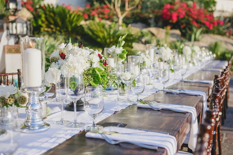 Natural Wedding Tablescape
Photography: Jasmine Star Photography
Read More:
http://www.insideweddings.com/weddings/spanish-style-ceremony-outdoor-ranch-wedding-reception/504/ Wood reception table with white runner and natural centerpieces