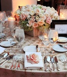 Embroidered Table Linens
Photography: Handeland Tesoro Photography
Read More:
http://www.insideweddings.com/weddings/elegant-outdoor-wedding-in-santa-barbara-california/387/ Elegant wedding table with rose and hydrangea centerpiece