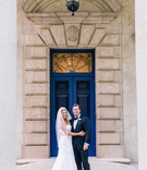 Lindsay Pitt %26 Brian Sims
Photography: Vue Photography
Read More:
http://www.insideweddings.com/weddings/a-wedding-planners-personalized-celebration-at-a-historic-mansion/824/ Bride in Anne Barge wedding dress and veil and groom in tuxedo and bow tie in front of blue door