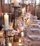 Elegant Bronze Candleholders
Photography: KingenSmith
Read More:
http://www.insideweddings.com/weddings/luxurious-summer-tent-wedding-on-lake-michigan-in-chicago-illinois/671/ Wedding reception table with sequin runner, pink and white flowers, and candleholders