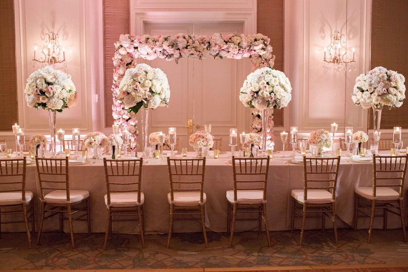 Long Reception Table, Pink and White Details
Photography: Perez Photography
Read More:
http://www.insideweddings.com/weddings/persian-american-ceremony-with-light-hued-reception-in-dallas/841/ long reception table pink white tall small centerpieces flower structure greenery gold chairs