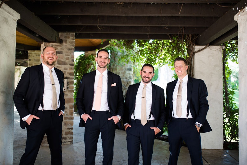 Groomsmen in Suspenders %26 Ties
Photography: Ashley Paige Photography
Read More:
http://www.insideweddings.com/weddings/elegant-outdoor-fall-wedding-at-a-rustic-chic-venue-in-malibu/1244/ groom in pink tie groomsmen in suits suspenders champagne tie tie clips hands in pockets