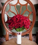 Red Rose Bouquet
Photography: John Solano Photography
Read More:
http://www.insideweddings.com/weddings/romantic-california-wedding-with-deep-red-details/318/ Crimson roses wrapped in white with brooch