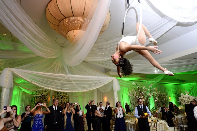 Aerialist Wedding Performer
Photography: Justin Marantz
Read More:
http://www.insideweddings.com/weddings/unforgettable-miami-wedding-with-acrobats-tiger-cubs-fireworks/437/ Cirque du Soleil-inspired aerialist performs at reception