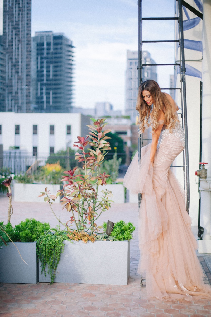 Stunning Blush Bridal Gown
Photography: Maya Myers Photography
Read More:
http://www.insideweddings.com/weddings/candlelit-jewish-ceremony-unique-cozy-outdoor-reception-in-la/1346/ bride on fire escape staircase downtown los angeles wedding venue blush inbal dror wedding dress