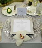 Silver Place Setting
Photography: David Wittig Photography
Read More:
http://www.insideweddings.com/weddings/vintage-inspired-chicago-wedding-with-rustic-elements/441/ Charger plates with lattice design and orchid topper