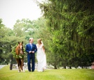Couple with Horse on Wedding Day