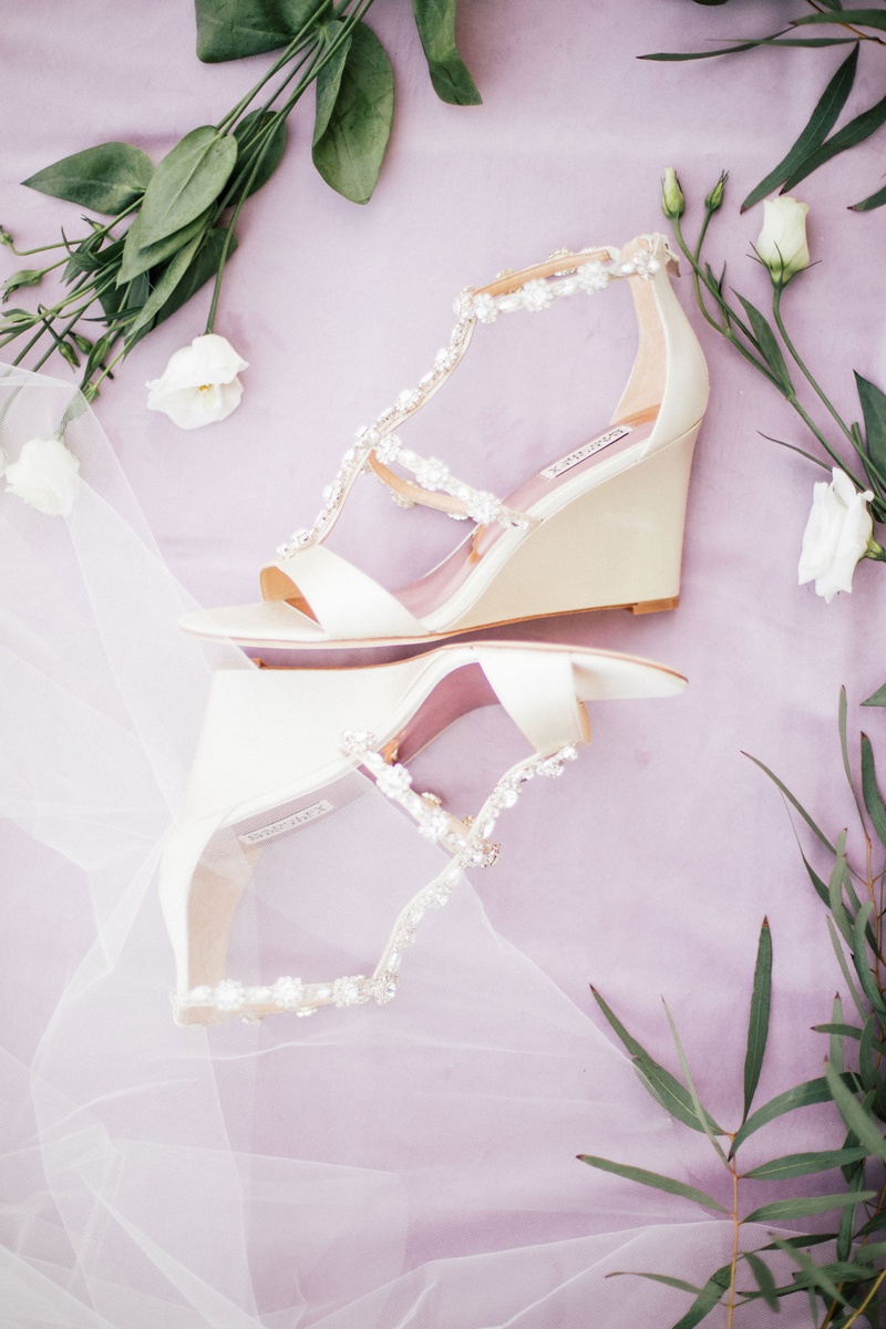 Ivory Bridal Wedge Heels
Photography: Anastasiia Photography
Read More:
http://www.insideweddings.com/weddings/interfaith-wedding-with-purple-emerald-color-palette-in-florida/1300/ badgley mischka wedge heels open toe beaded straps ivory color wedding shoes bridal heels