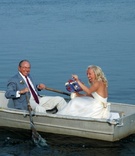 Rowboat Grand Entrance
Photography: MBV Photography
Read More:
http://www.insideweddings.com/weddings/seaside-wedding-with-colorful-details-in-massachusetts/202/ Father of bride rows oars of rowboat with bride in boat