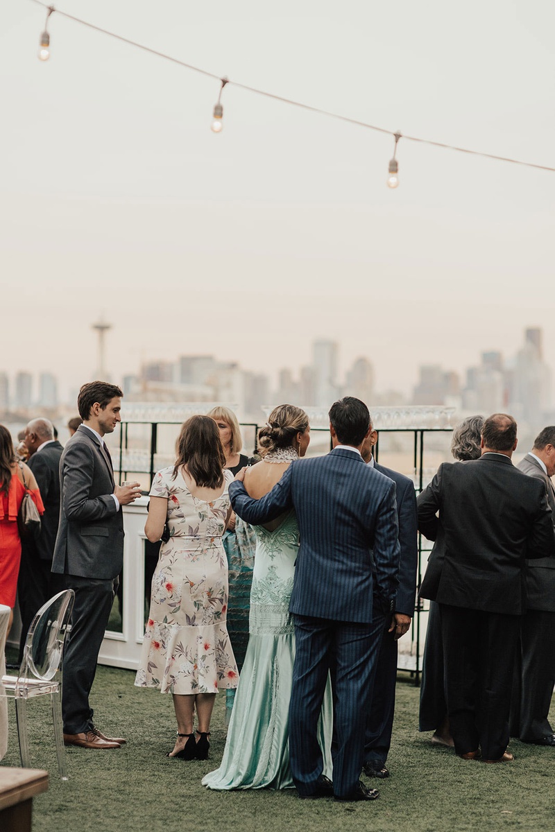 Guests Enjoying Seattle Cocktail Hour
Photography: Sam %26 Sola Lee Photography
Read More:
http://www.insideweddings.com/weddings/modern-outdoor-ceremony-tent-reception-in-seattle-on-puget-sound/1309/ wedding cocktail hour guests enjoying mingling string bistro lights seattle skyline water