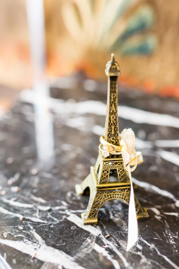 Wedding Rings on Eiffel Tower Décor
Photography: Pierre Torset - Paris Photographer
Read More:
http://www.insideweddings.com/weddings/elegant-outdoor-summer-destination-wedding-at-a-garden-in-france/1268/ paris eiffel tower with ribbon and yellow gold wedding rings engagement ring men's band