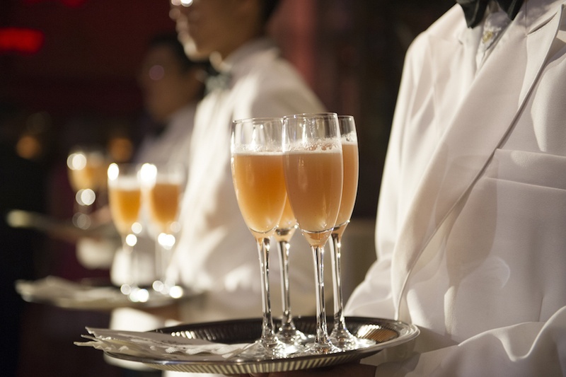 Wedding Cocktail Hour At Cipriani Wall Street With Servers In White Blazers Tray Of Drinks Wedding Cocktail Hour At Cipriani Wall Street With Servers In White Blazers Tray Of Drinks