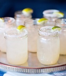 Mason Jar Margaritas
Photography: Elisabeth Millay Photography
Read More:
http://www.insideweddings.com/weddings/fourth-of-july-pre-wedding-party-in-central-california-countryside/655/ Margaritas in mason jars rimmed with salt and garnished with limes