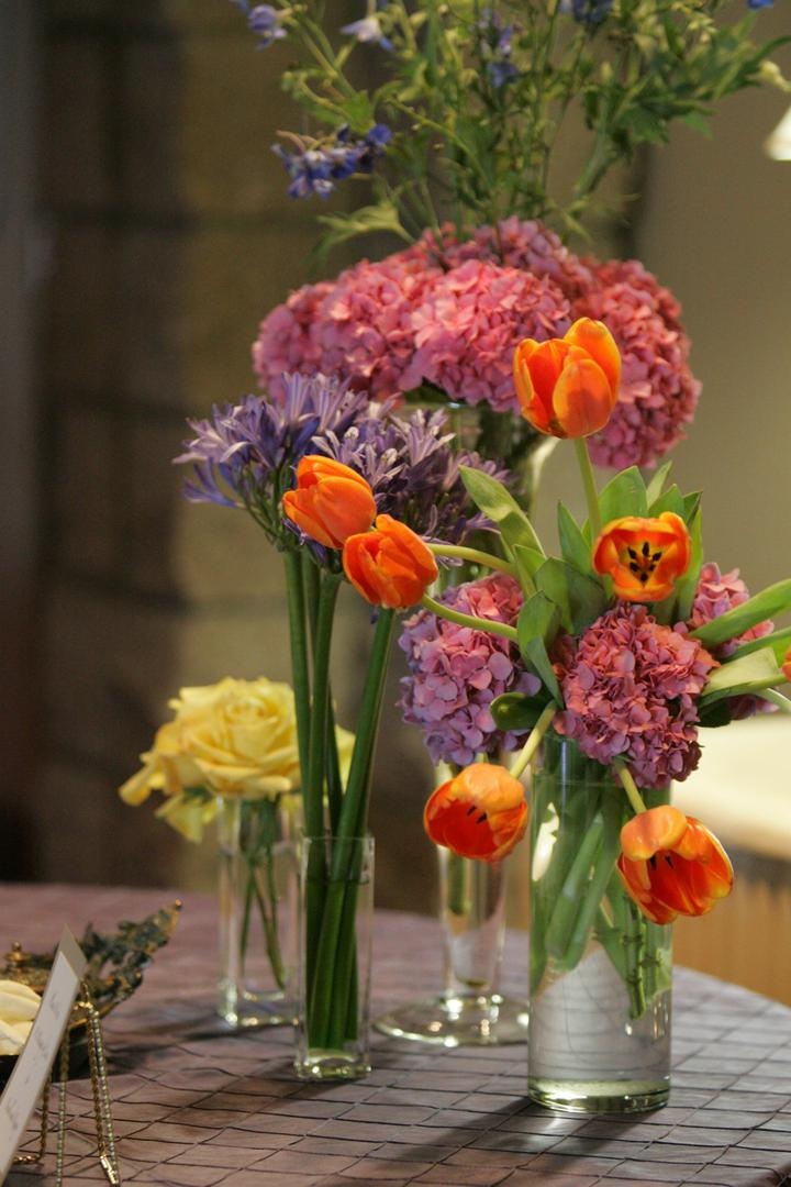 Colorful Floral Arrangements
Photography: Lyn Sims Photographer
Read More:
http://www.insideweddings.com/weddings/glamorous-fall-wedding-with-garden-touches-in-tucson-arizona/258/ Flower display on guest book table