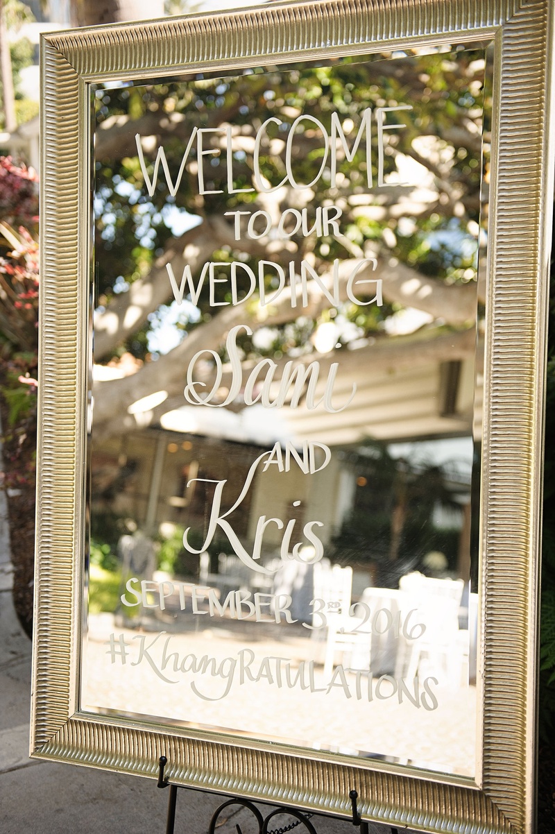 Calligraphy on Frame at Wedding
Photography: Next Exit Photography
Read More:
http://www.insideweddings.com/weddings/alfresco-interfaith-ceremony-ballroom-reception-in-santa-monica/963/ Wedding ceremony welcome sign on mirror frame easel at outdoor wedding santa monica fairmont bungalo
