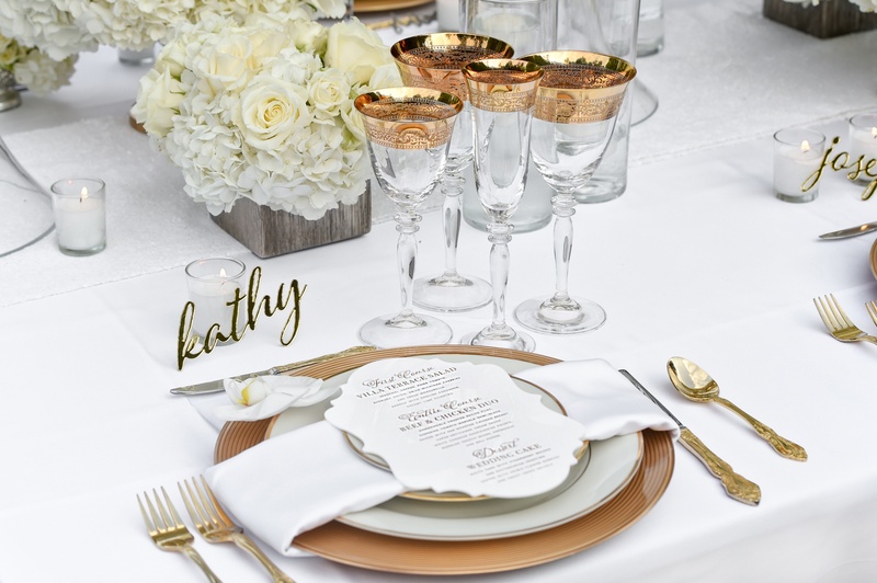 Place Setting with Gold Details
Photography: Carasco Photography
Read More:
http://www.insideweddings.com/weddings/styled-shoot-combines-old-world-charm-and-contemporary-fashion/849/ wedding place setting with gold laser cut place setting, gold chargers, gold flatware, and an orchid