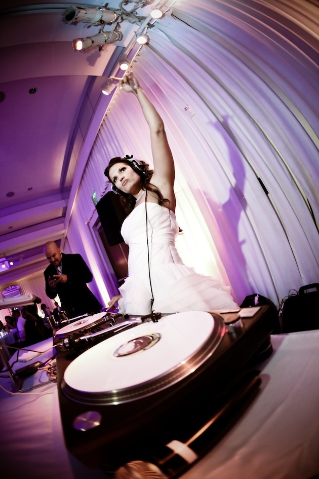 Bride at DJ Booth
Photography: Jessica Lewis Photography
Read More:
http://www.insideweddings.com/weddings/summer-wedding-at-the-sls-hotel-beverly-hills-california/460/ Bride wearing headphones at DJ spin scratch station