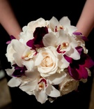 Rose %26 Orchid Bouquet
Photography: Michael Carr Photography
Read More:
http://www.insideweddings.com/weddings/exceptional-wedding-event-in-historical-houston-building/468/ Bridesmaid holding white rose and purple orchid bouquet