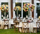 Wood Chairs Around Tables Under Tent