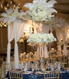 Round Table, Navy Linen with Pattern, Feather Arrangement
Photography: Old South Studios
Read More:
http://www.insideweddings.com/weddings/glamorous-north-carolina-wedding-with-a-wintry-shakespeare-motif/984/ round table navy linen pattern feather arrangement north carolina wedding flowers crystals gold