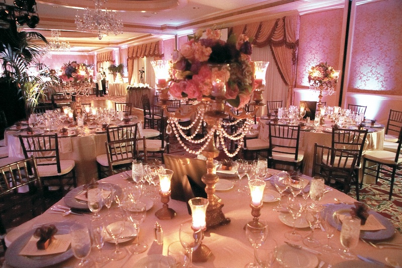 Elegant Ballroom Reception
Photography: Tony Florez Photography
Read More:
http://www.insideweddings.com/weddings/grand-ballroom-wedding-at-the-ritz-carlton-in-southern-california/97/ Ballroom with pink lighting and lavender and pink centerpieces