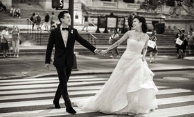 Couple in New York City Crosswalk
Photography: Christian Oth Studio
Read More:
http://www.insideweddings.com/weddings/traditional-chinese-tea-ceremony-glamorous-new-york-city-wedding/884/ Black and white photo of Chinese American bride and groom in crosswalk of New York City street