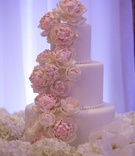 White Cake with Sugar Flower Peonies
Photography: Sakosan Photography
Read More:
http://www.insideweddings.com/weddings/armenian-wedding-with-church-ceremony-blush-white-reception/809/ White three tier wedding cake with beading, sugar flowers cascading down peony blush hydrangea